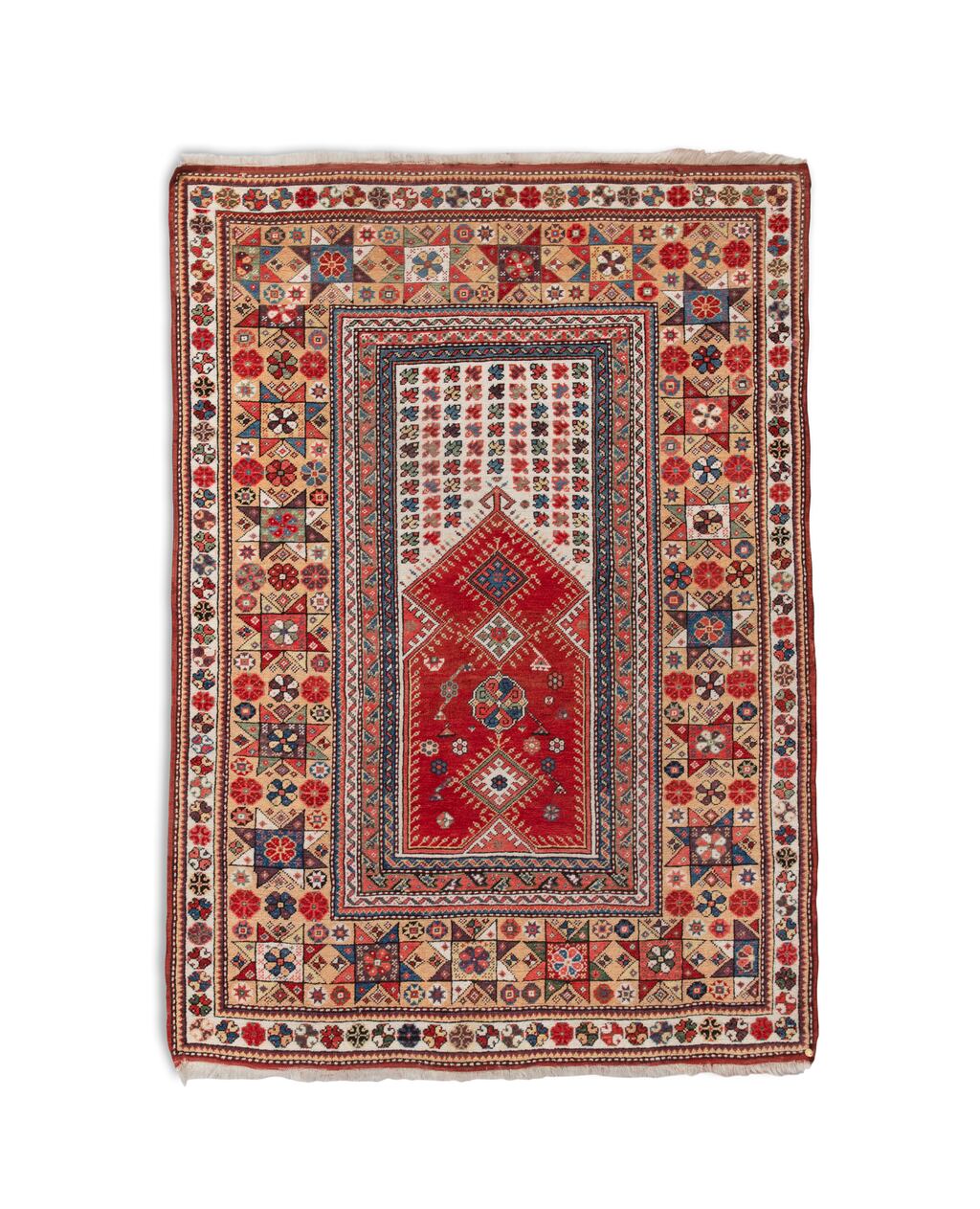 An antique Milas prayer rug from 1850, its border decorated with Solomon stars and blossoms (€3,500-€5,000) at Adam's auction of Peter Linden Oriental Carpet Collection.