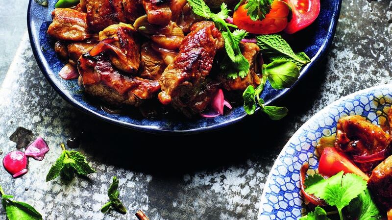 Shaking beef salad with pickled red onion