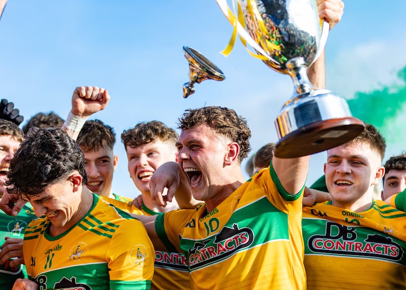 Dunloy Cuchulainns' Eoin O'Neill lifts the trophy after the victory over Cargin in the Antrim SFC final at Corrigan Park in Belfast. Photograph: Dan Clohessy/Inpho