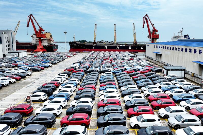 Chinese-made cars are seen before being loaded onto a ship at the port in Lianyungang, in China's eastern Jiangsu province. Photograph: STR/AFP via Getty Images