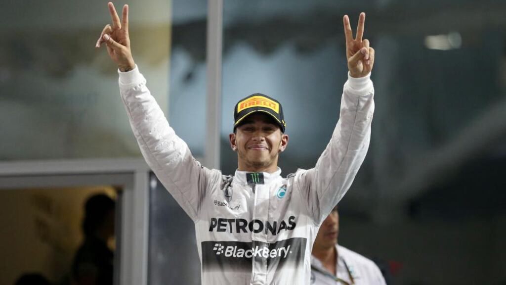 Lewis Hamilton celebrates becoming World Champion after victory in the 2014 Abu Dhabi Grand Prix. Photograph: David Davies/Pa
