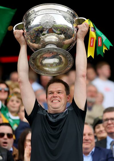 Colin Trainor, data analyst with Kerry and an Armagh native, lifts the Sam Mauire at Croke Park after the Kingdom's All-Ireland final victory over Galway last July. Photograph: James Crombie/Inpho