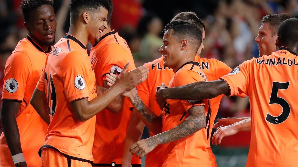 Philippe Coutinho celebrates with team mates after a goal against Crystal Palace at the Premier League Asia Trophy in Hong Kong. Photograph: Getty Images