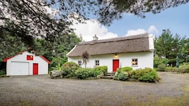 Escape to this gorgeous thatched fishing lodge on the shores of Lough Conn for €285k