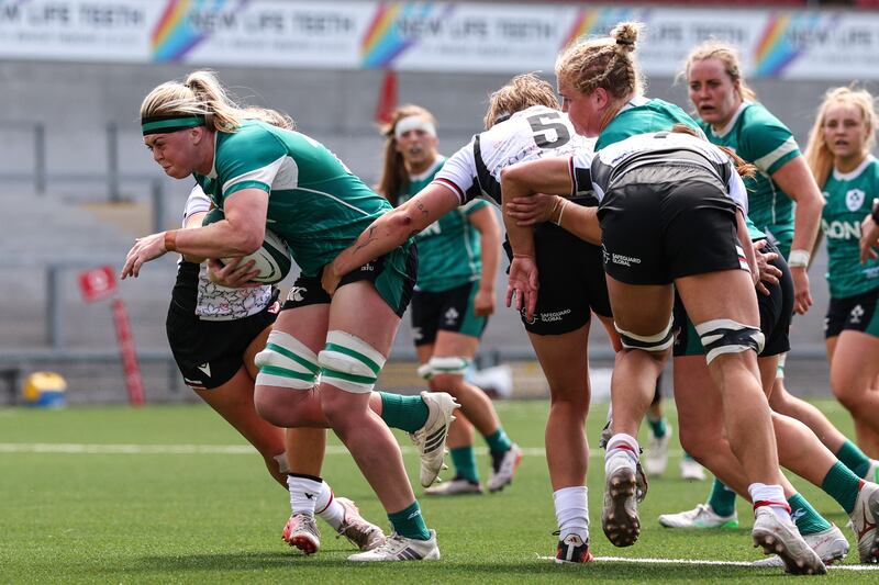Ireland's Sam Monaghan breaks past Tyson Beukeboom of Canada. Photograph: INPHO/ Ben Brady