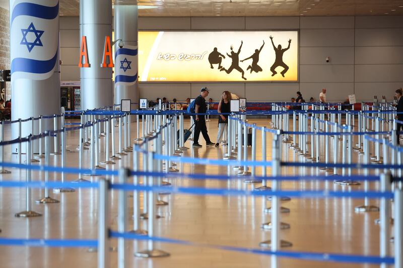 Passengers walk by an empty waiting area at the Ben Gurion International Airport during a general strike in Israel. Photograph: EPA