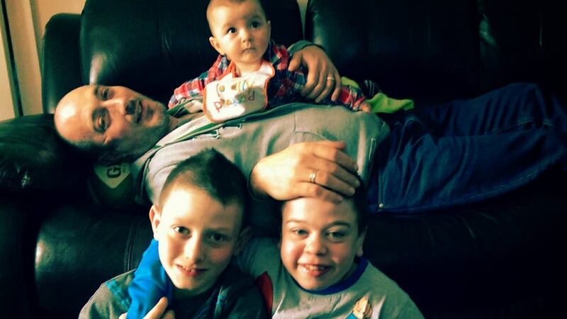 Geraldine’s husband Dave with children Jack, Ethan and Daniel (top).