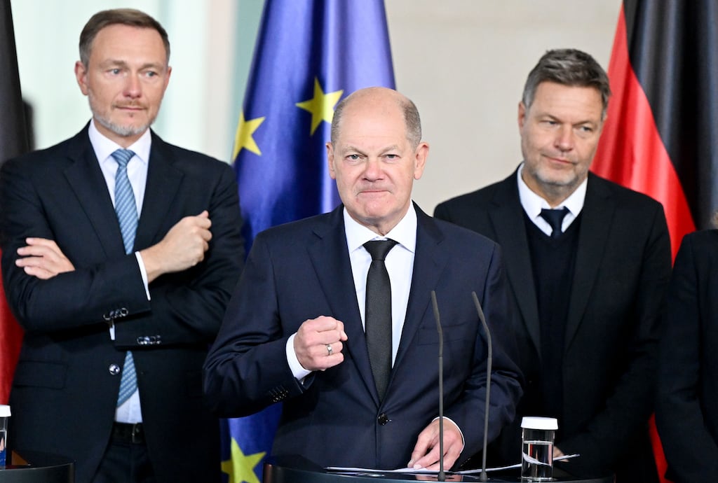 Germany's chancellor Olaf Scholz (centre), minister for economy and climate Robert Habeck (right) and minister for finance Christian Lindner (left) are under pressure as the country's economy struggles