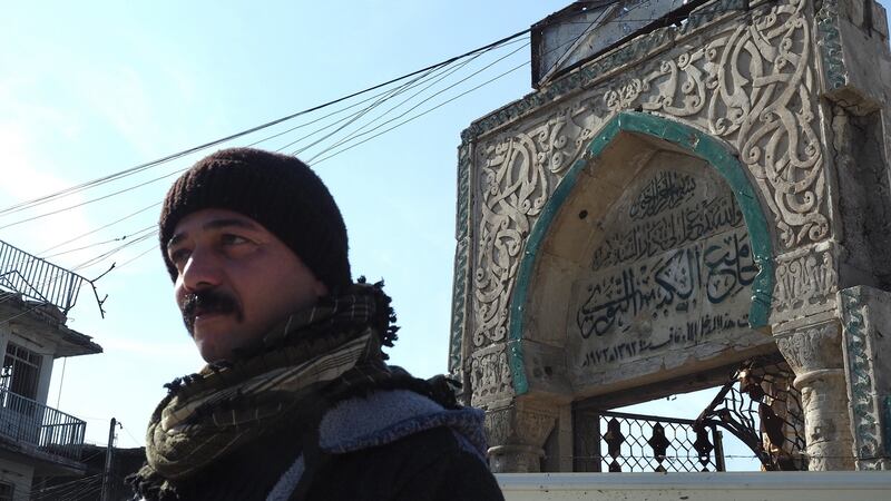Ahmed Khelil by the Great Mosque of Al-Nuri, where IS chief Abu Bakr al-Baghdadi announced the caliphate. When IS blew up the mosque in the 2017 Battle of Mosul, it was seen as gesture of defeat. Now being rebuilt with international aid. Photograph: Lorraine Mallinder