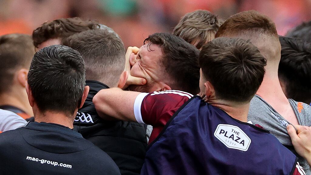 Galway's Damien Comer clashes with a member of the Armagh panel on Sunday at Croke Park. Photograph: James Crombie/Inpho