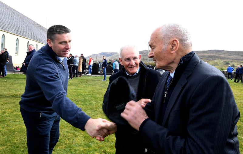 Darragh Ó Sé greets legendary Kerry midfielder Mick O'Connell at the funeral of Mick O'Dwyer at St Finian's Church, Waterville. Photograph: Don MacMonagle