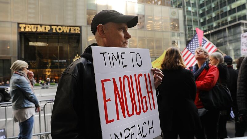 Protesters gather outside Trump Tower in Manhattan on Wednesday. Photograph: Spencer Platt/Getty Images
