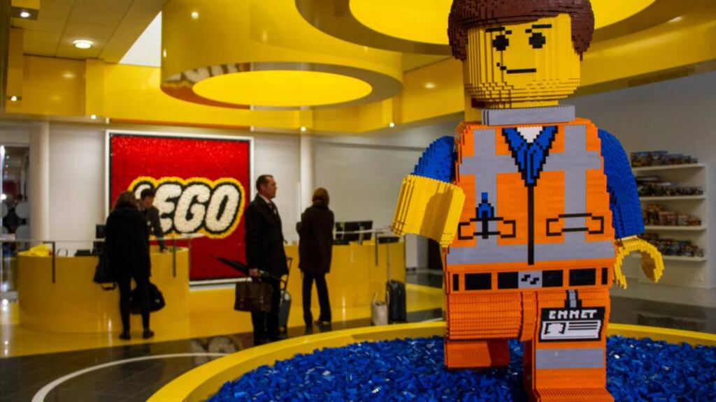 A Lego brick figurine of Emmet Brickowoski, a character from “The Lego Movie”, stands in the reception area at the headquarters of Lego A/S in Billund, Denmark. Lego said full-year revenue advanced 13 per cent, outpacing the building-block maker’s key rivals, helped by toys based on “The Lego Movie.” (Photograph: Freya Ingrid Morales/Bloomberg)