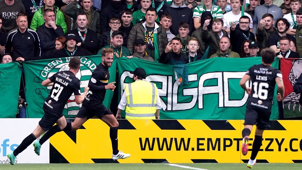 Livingston’s Andrew Shinnie (centre) celebrates scoring their side’s first goal of the game during the Scottish Premiership match against Celtic at the Tony Macaroni Arena. Photo: Andrew Milligan/PA Wire