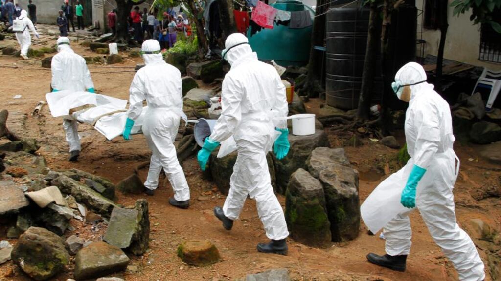 Figures released from the United Nations World Health Organization (WHO) indicate the death toll from Ebola in Guinea, Liberia and Sierra Leone has exceeded 3,300. Photograph: Ahmed Jallanzo/EPA