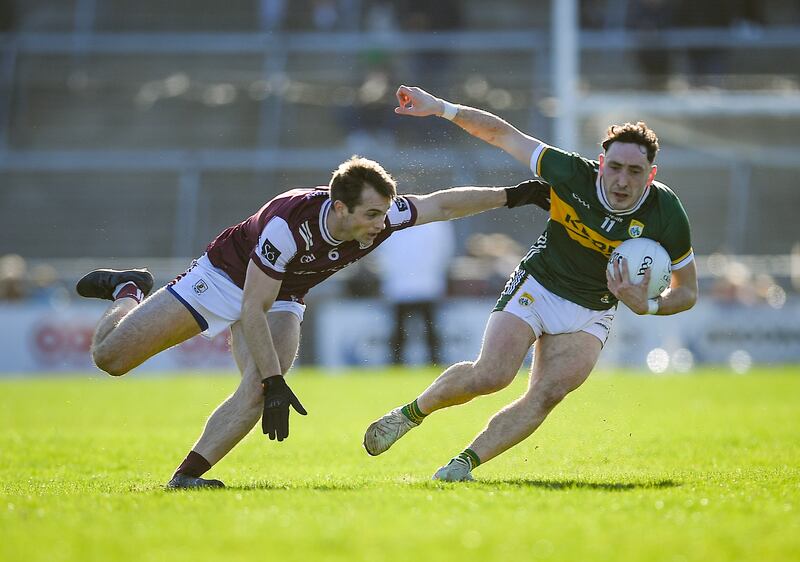 Kerry’s Paudie Clifford tries to get clear of Galway's Liam Silke. Photograph: Tommy Grealy/Inpho