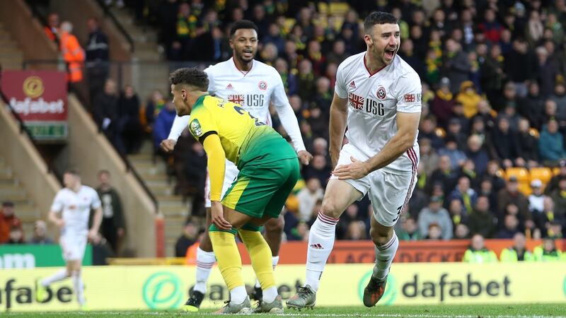 Enda Stevens celebrates scoring Sheffield United’s first goal during the Premier League match against Norwich City. Photograph: Naomi Baker/Getty Images