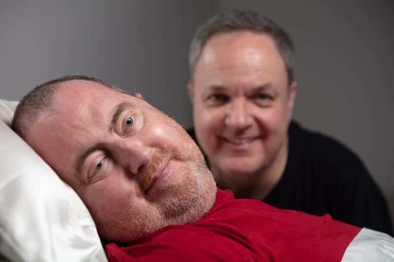 David Moclair (left) with his husband Jonathan. Photograph: Rob Wilson