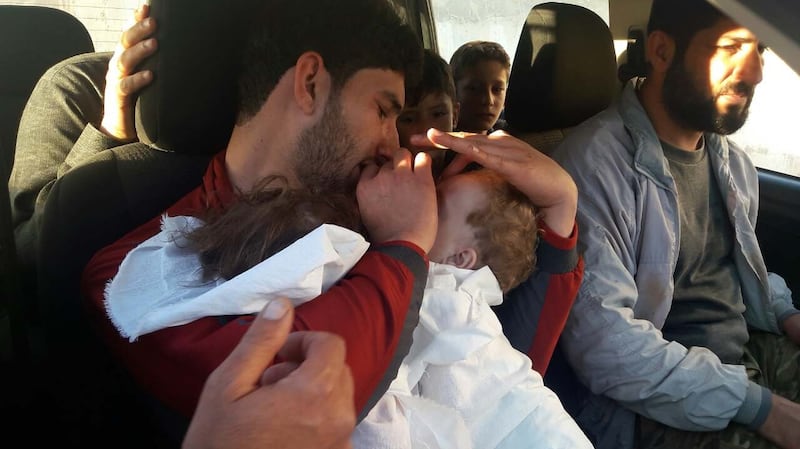 Abdulhamid al-Yousef grieves over the bodies of his nine-month-old twins, Ahmad and Aya, at Khan Sheikhoun in Syria last week. Photograph: Alaa al-Yousef