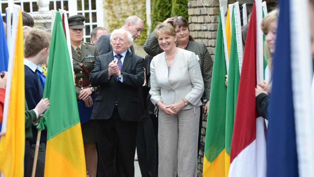 President Michael D Higgins is welcomed to the Young Social Innovators 2012 Awards by students and awards founder Sr Stanislaus Kennedy. Photograph: Alan Betson