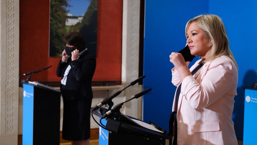 First Minister Arlene Foster and Deputy First Minister Michelle O’Neill during the daily media broadcast at Stormont. Photograph: Kelvin Boyes/Press Eye/PA Wire