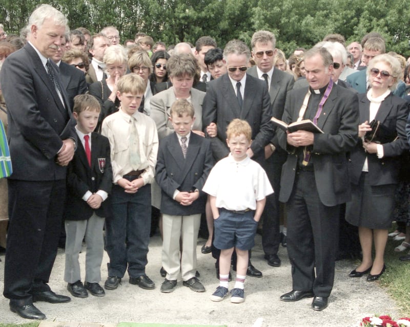 Veronica Guerin's son Cathal (front), her husband Graham Turley (behind) and Veronica's mother during her funeral in June 1996. Photograph: Paddy Whelan