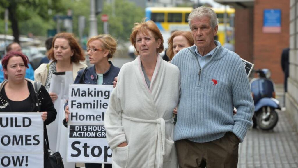 Martin Coyne (72) and his wife Violet (61) in her dressing gown and slippers leaving the Four Courts last August after a contempt hearing, after they were evicted from the home they rented for 15 years at Carpenterstown, Dublin. Photograph: Alan Betson/The Irish Times