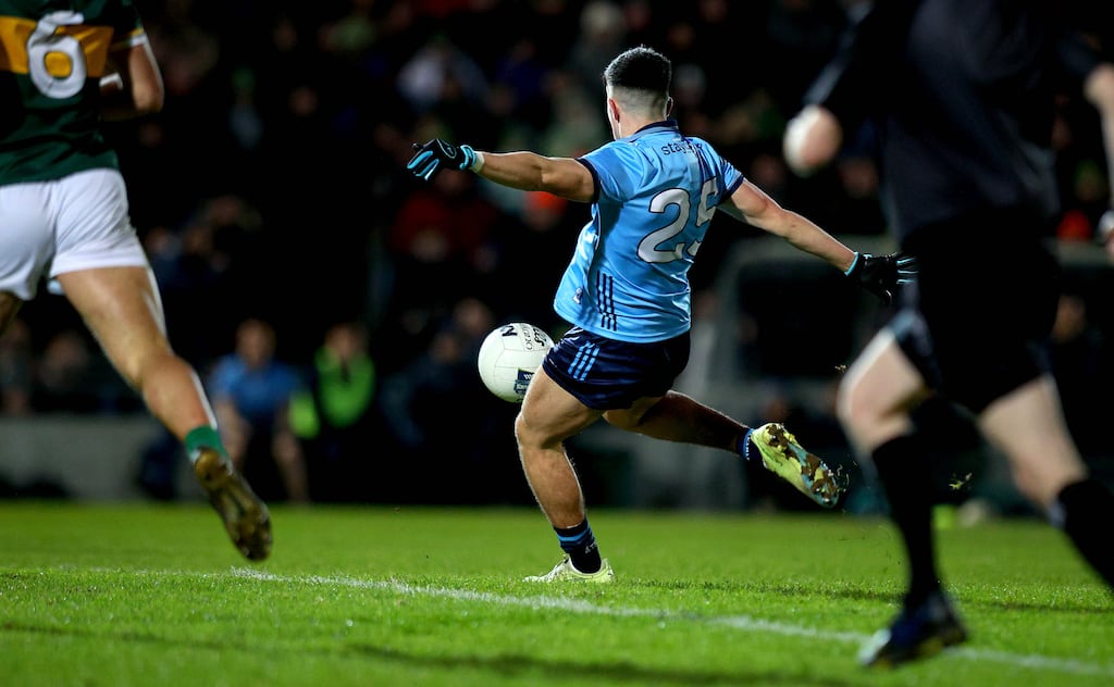 Dublin’s Loran O'Dell kicks a two pointer late in the game against Kerry in Tralee. Photograph: Ryan Byrne/Inpho