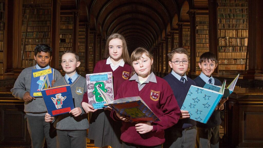 From left, at the launch of the Bookmarks exhibition in Trinity’s Long Room were Erik Paul and Clayton Fagan of Drimnagh Castle; Sarah-Ann Mitchell and Caithlain Hanlon of Scoil Cholmcille, Ballybrack; Ryan Loehmann and Finn Wallace of Scoil Eoin, Kilbarrack. Photograph: Paul Sharp/SharpPix