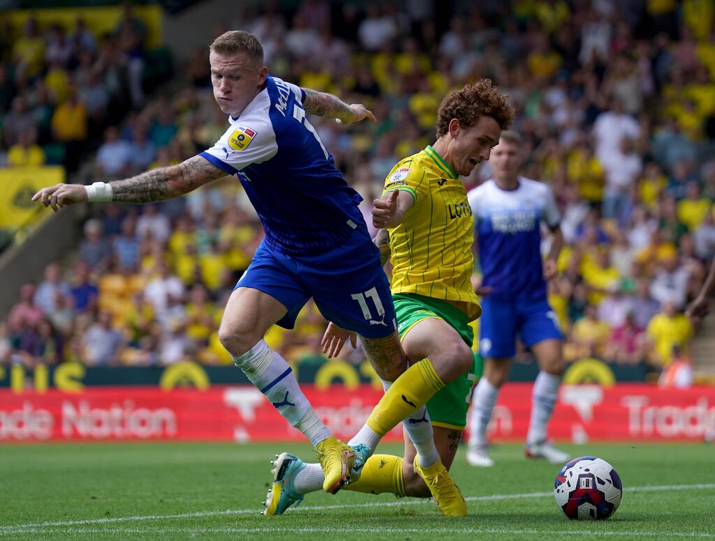 Wigan Athletic's James McClean (left) and Norwich City's Josh Sargent battle for the ball. Photograph: Joe Giddens/PA Wire