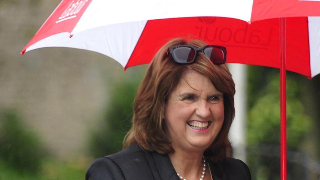 Tánaiste Joan Burton: “It is my view that the charge for the type of household the deputy described will be below €200.” Photograph: Aidan Crawley