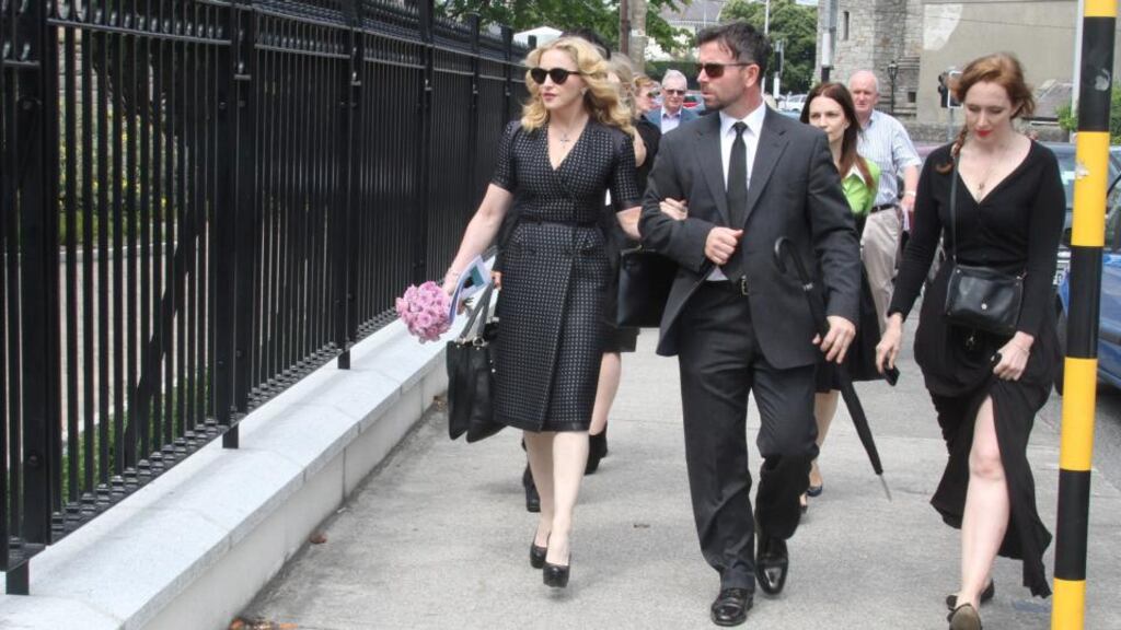 Madonna arriving at St. Patrick’s Church in Monkstown today for the funeral mass of David Collins. Photograph: Mark Doyle