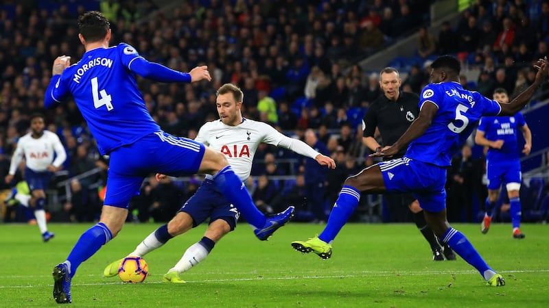 Christian Eriksen scores Tottenham Hotspur’s third against Cardiff. Photograph: Mark Kerton/PA