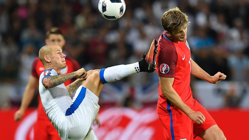 Slovakia’s Vladimir Weiss vies for the ball with England’s Eric Dier during the Euro 2016 Group B match at the Geoffroy-Guichard stadium in Saint-Etienne. Photograph: Joe Klamar/AFP/Getty Images