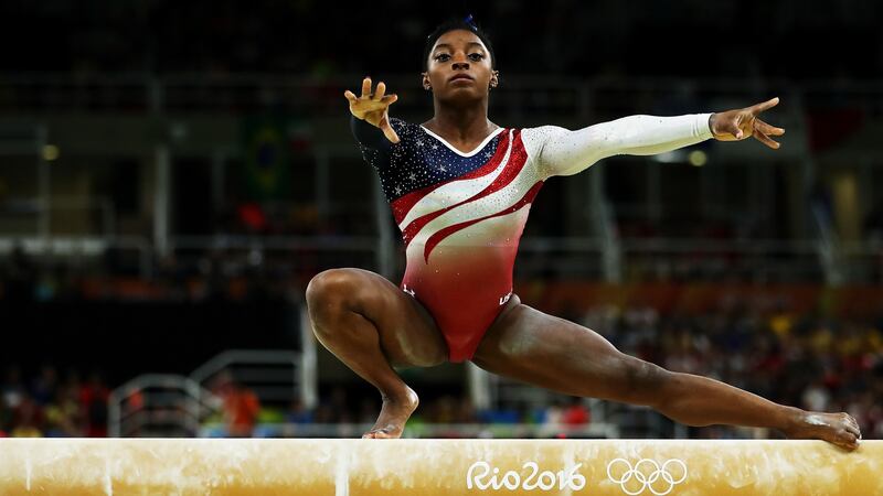 Simone Biles on the balance beam during the Artistic Gymnastics Women’s Team Final of the Rio 2016 Olympic Games. Photograph: Lars Baron/Getty Images
