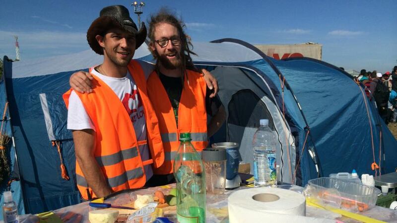 James and Fabian from Zurich, Switzerland, making soup and smoothies for migrants. Photograph: Daniel McLaughlin