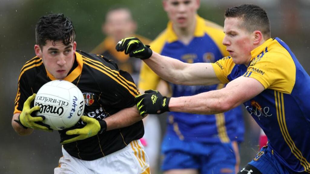 Antrim’s Ryan Murray in action against Roscommon’s Sean McDermott at the Allianz Football League Division Three match at Casement Park in  Co Antrim on Saturday. Photograph: John McIlwaine/Presseye/Inpho