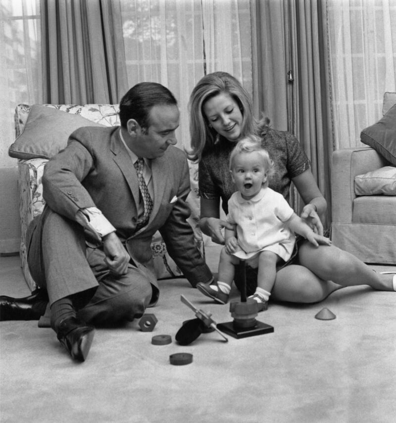 Rupert Murdoch with his second wife Anna Maria Torv and their 14-month old daughter Elisabeth at their home in Sussex Gardens, London, in 1969. Photograph: Chris Ware/Keystone/Hulton Archive/Getty Images