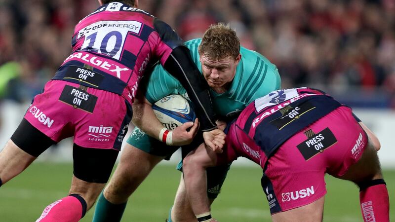 Munster prop Stephen Archer is tackled by Danny Cipriani and Fraser Balmain of Gloucester during the Heineken Champions Cup match at Kingsholm. Photograph: Dan Sheridan/Inpho