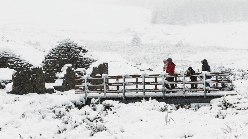 A group of walkers make their way along St Kevin’s Way on the Wicklow Gap. Photograph: Garry O’Neill