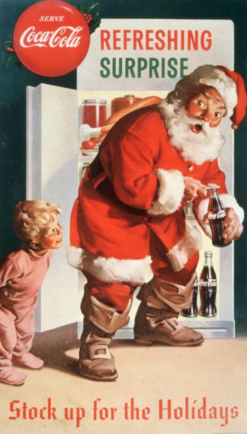 An advertising poster by Haddon Sundblom shows a young boy surprising Santa Claus. Photograph: Library of Congress/Corbis/VCG via Getty Images
