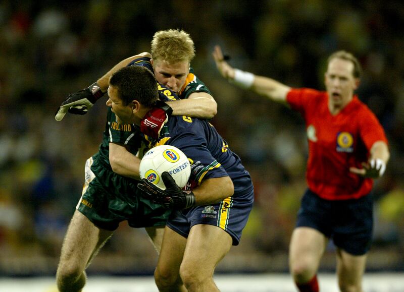 Ireland's Anthony Lynch with Chris Johnson of Australia during the second International Rules test in Melbourne in 2003. Photograph: Morgan Treacy/Inpho