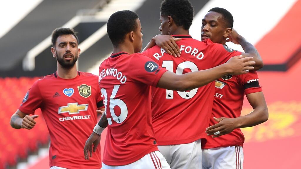 Mason Greenwood, Anthony Martial and Bruno Fernandes congratulate Marcus Rashford on his goal against Bournemouth. Photograph: Michael Regan/Getty