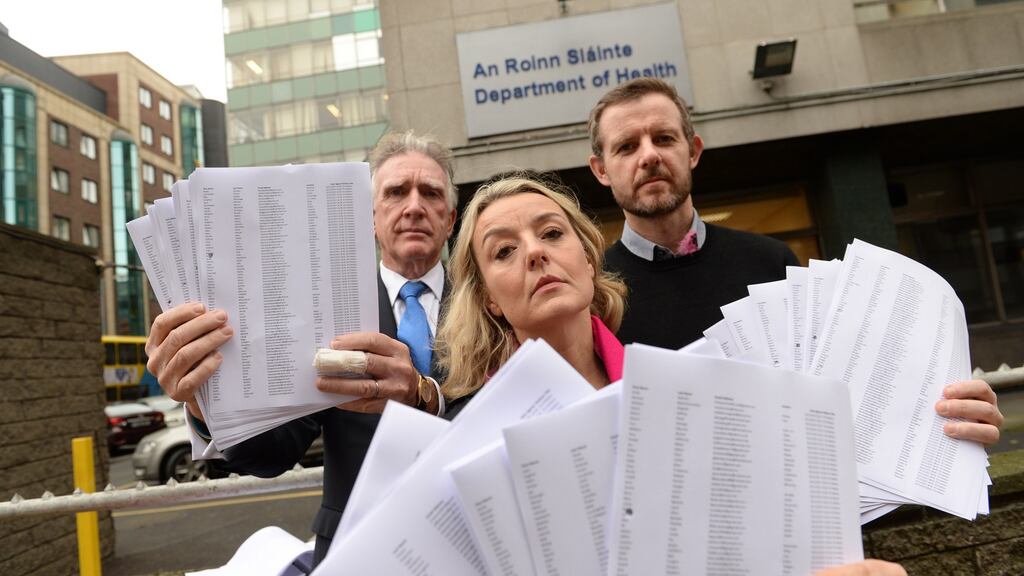 L-R: Noel Smyth (chairman 3ts) together with Fiona and Tim Tuomey deliver a copy of more than 30,000 petition signatures to HSE. Photograph: Dara Mac Donaill/The Irish Times