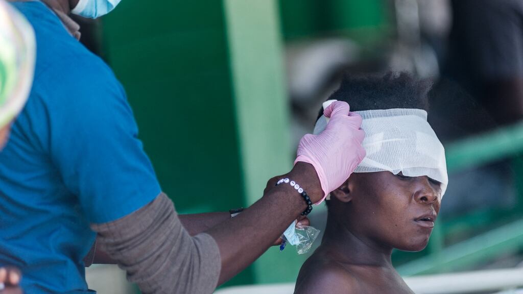 An injured woman is treated at a hospital in Les Cayes, Haiti, after Saturday’s 7.2 magnitude earthquake. Photograph: Reginald Louissaint Jr/AFP via Getty Images