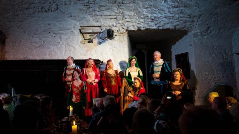 Entertainers performing at the banquet at Bunratty Castle.  Photograph: Alan Place