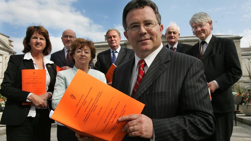 Seán Fleming (front): said his party would press ahead with its election promise to abolish Irish Water and suspend water charges for five years.