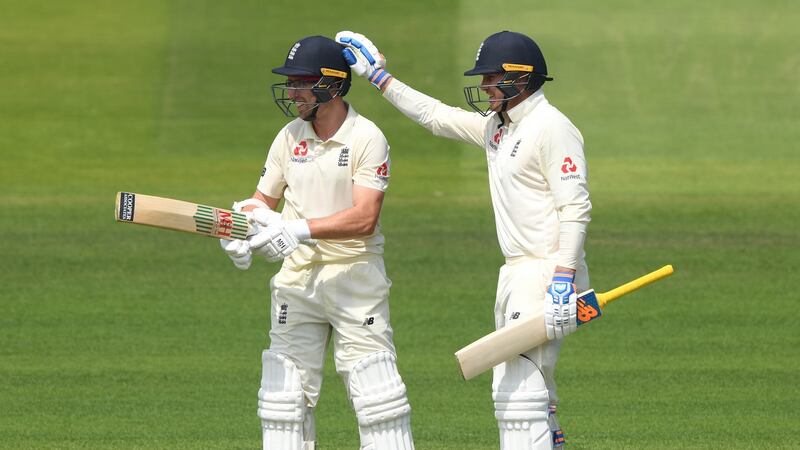 Jason Roy congratulates Jack Leach on reaching his half century against Ireland at Lord’s. Photograph: Stu Forster/Getty