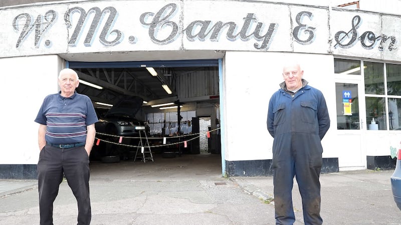 Mechanics Denis Murphy and Martin Canty, proprietor, at the repairs/garage premises of WM Canty & Son (established 1928) at Anglesea Street, Cork.
