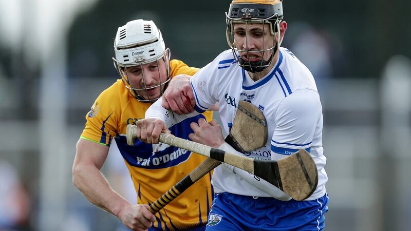 Waterford’s Maurice Shanahan takes on Clare’s Patrick O’Connor at Walsh Park. Photograph: Laszlo Geczo/Inpho